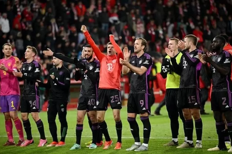 Bayern thump Union Berlin as Mueller marks milestone with double