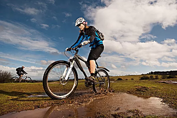 What is the proper posture for riding a bike?